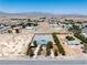 Elevated view showcasing the property, its expansive layout, and views of the surrounding landscape at 2950 Winchester Ave, Pahrump, NV 89048