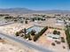 Aerial view of the property, showcasing the home's location and surrounding desert landscape at 2950 Winchester Ave, Pahrump, NV 89048
