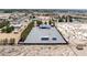 Aerial view showcasing the extensive gravel yard, the home, and outbuildings at 2950 Winchester Ave, Pahrump, NV 89048