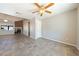 Open-concept room featuring tile flooring, fireplace, and bright neutral walls at 2950 Winchester Ave, Pahrump, NV 89048