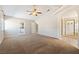Vaulted ceiling, ceiling fan and exterior access highlight this large main bedroom at 2950 Winchester Ave, Pahrump, NV 89048