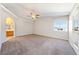 Spacious main bedroom features vaulted ceiling, ceiling fan and natural light at 2950 Winchester Ave, Pahrump, NV 89048