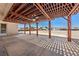 Expansive covered patio with ceiling fan, perfect for relaxing or entertaining in the backyard space at 2950 Winchester Ave, Pahrump, NV 89048