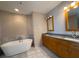 Elegant bathroom featuring a soaking tub, dual vanities, and high-end finishes at 4525 Dean Martin Dr # 2704, Las Vegas, NV 89103