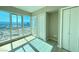 Bright bedroom with expansive windows showcasing city views and offering ample closet space at 4525 Dean Martin Dr # 2704, Las Vegas, NV 89103