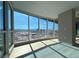 Sun-drenched living space with panoramic city views through expansive floor-to-ceiling windows at 4525 Dean Martin Dr # 2704, Las Vegas, NV 89103