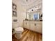Bathroom with a large mirror, tile flooring, and updated vanity at 4963 Crooked Stick Way, Las Vegas, NV 89113