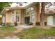 A well maintained home exterior with a large patio and manicured lawn at 4963 Crooked Stick Way, Las Vegas, NV 89113