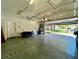 Large garage offering secure parking and extra storage space, featuring convenient access to the outdoors at 4963 Crooked Stick Way, Las Vegas, NV 89113