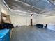 Spacious garage with ample storage space and an insulated ceiling for climate control at 4963 Crooked Stick Way, Las Vegas, NV 89113