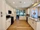 Bright kitchen with granite countertops and stainless steel appliances at 4963 Crooked Stick Way, Las Vegas, NV 89113