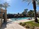 Enjoy the community pool with lounge chairs and cabanas, perfect for relaxation and outdoor fun on a sunny day at 4963 Crooked Stick Way, Las Vegas, NV 89113