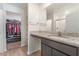 Bathroom vanity area and a walk-in closet, providing lots of storage at 518 Descubir Ave, North Las Vegas, NV 89081
