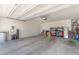 Spacious garage with ample storage space, utility connections, and vehicle parking at 518 Descubir Ave, North Las Vegas, NV 89081