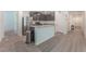 Charming kitchen with stainless steel appliances, granite countertops, and an island at 518 Descubir Ave, North Las Vegas, NV 89081