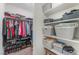 Spacious walk-in closet featuring ample storage space with racks, shelves, and floor space at 518 Descubir Ave, North Las Vegas, NV 89081
