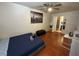 Comfortable bedroom showcasing wood floors, neutral walls and decor, and a ceiling fan at 5499 Indian River Dr # 356, Las Vegas, NV 89103