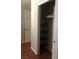 Bedroom closet featuring metal shelving, wood-look flooring, and white walls, maximizing storage at 5499 Indian River Dr # 356, Las Vegas, NV 89103