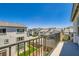 This balcony offers scenic views of the neighborhood and features modern railings for a stylish outdoor living experience at 5804 Gossamer Stone Ct, Las Vegas, NV 89141