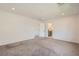 Large bedroom with a view into the bathroom and natural light at 5804 Gossamer Stone Ct, Las Vegas, NV 89141