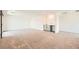 Spacious living room featuring neutral colored carpet, white walls, and recessed lighting at 5804 Gossamer Stone Ct, Las Vegas, NV 89141
