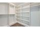 Spacious walk-in closet with custom shelving to maximize storage at 5804 Gossamer Stone Ct, Las Vegas, NV 89141