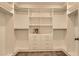 Walk-in closet featuring custom shelving, drawers, and ample storage space at 5804 Gossamer Stone Ct, Las Vegas, NV 89141