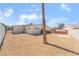Low maintenance backyard with desert landscaping, a privacy fence, and a gravel ground cover at 600 Berry Cir, Las Vegas, NV 89107