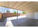 Inviting covered patio in the backyard, ideal for outdoor dining and relaxation at 600 Berry Cir, Las Vegas, NV 89107