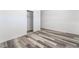 This cozy bedroom has wood floors and a sliding door closet at 600 Berry Cir, Las Vegas, NV 89107