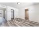 This bedroom features wood floors, neutral paint, and closet at 600 Berry Cir, Las Vegas, NV 89107