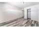 This light bedroom has gray wood floors and a closet at 600 Berry Cir, Las Vegas, NV 89107