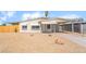 Attractive home with covered porch and desert-style landscaping for low maintenance at 600 Berry Cir, Las Vegas, NV 89107