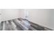 This room has new wood floors and neutral paint at 600 Berry Cir, Las Vegas, NV 89107