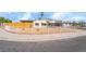 Charming single-story home with well-maintained front yard and secure fence at 600 Berry Cir, Las Vegas, NV 89107