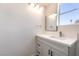 Bathroom featuring vanity, countertop, sink and window at 600 Berry Cir, Las Vegas, NV 89107