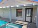 View of backyard pool with patio, pergola, and access to the home's interior at 6636 Old Oxford Ave, Las Vegas, NV 89108