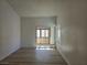 Bedroom with an attached sunroom and neutral paint colors at 6636 Old Oxford Ave, Las Vegas, NV 89108
