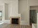 Cozy fireplace with hearth detail, creating a warm focal point in the living area at 6636 Old Oxford Ave, Las Vegas, NV 89108