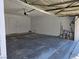 Clean and functional two-car garage with ample space for vehicles and storage at 6636 Old Oxford Ave, Las Vegas, NV 89108