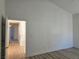Open bedroom featuring a view of the hallway with tile flooring at 6636 Old Oxford Ave, Las Vegas, NV 89108