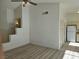 Open-concept living area showcasing modern flooring and neutral walls with easy kitchen access at 6636 Old Oxford Ave, Las Vegas, NV 89108