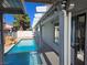 Beautiful backyard pool with pergola, string lights and view of house at 6636 Old Oxford Ave, Las Vegas, NV 89108