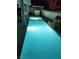 Inviting backyard pool with lights at night at 6636 Old Oxford Ave, Las Vegas, NV 89108