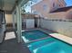 Backyard pool with adjacent patio area, perfect for outdoor entertaining and relaxation at 6636 Old Oxford Ave, Las Vegas, NV 89108
