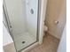 Modern tiled walk-in shower with glass enclosure at 6636 Old Oxford Ave, Las Vegas, NV 89108