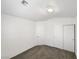 Bright bedroom with closet doors, white walls, and neutral carpet at 6696 Merced Lake Dr, Las Vegas, NV 89156