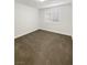 Cozy bedroom with carpet, and plantation shutters at 6696 Merced Lake Dr, Las Vegas, NV 89156