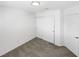 Bright bedroom features closet doors, a neutral carpet, and white painted walls at 6696 Merced Lake Dr, Las Vegas, NV 89156
