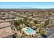Beautiful community featuring a sparkling pool, playground, lush landscaping, and well-maintained homes at 694 Value Ridge Ave, Henderson, NV 89012